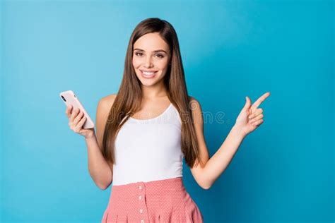 Portrait Of Positive Cheerful Girl Use Smartphone Indicate Social Media