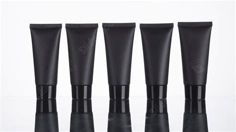 Black Cream Bottle Skincare Powerpoint Background For Free Download