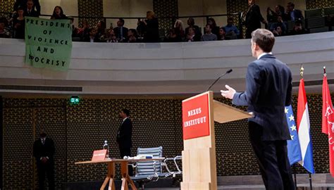 Protesters disrupt Macron speech on Dutch state visit