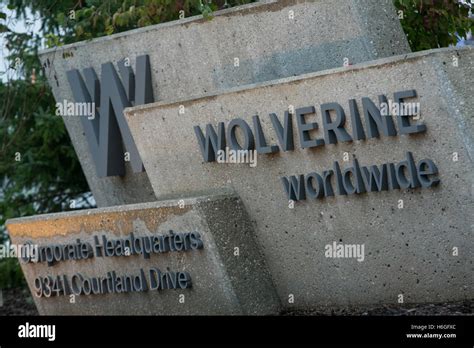 A logo sign outside of the headquarters of Wolverine Worldwide in