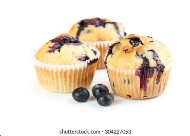 Tasty Blueberry Muffin Isolated On White Stock Photo