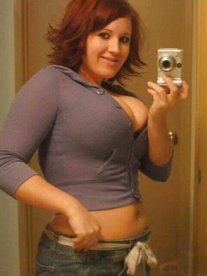 Busty Smiling Redhead Porn Pic