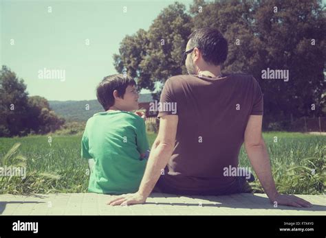 Mature Father And Son Sitting Hi Res Stock Photography And Images Alamy