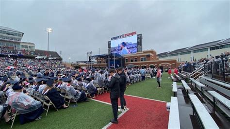 Liberty University students celebrate graduation despite inclement weather