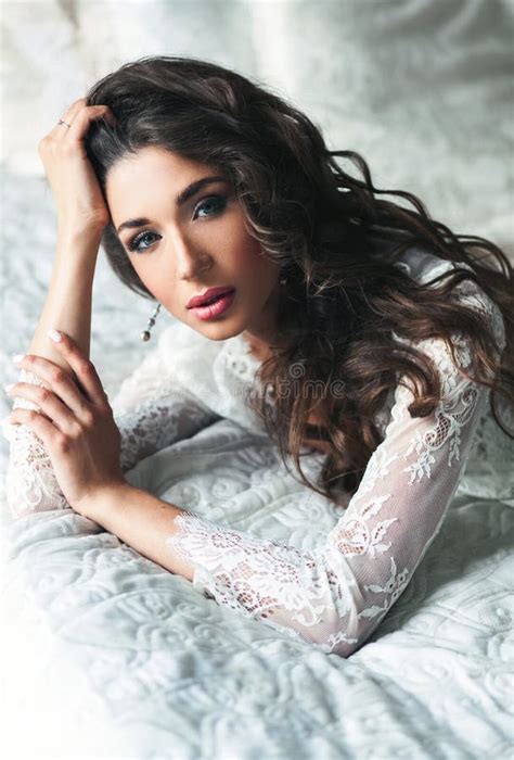 Woman Posing On Bed In White Lingerie Stock Photo Image Of Sensual Lingerie