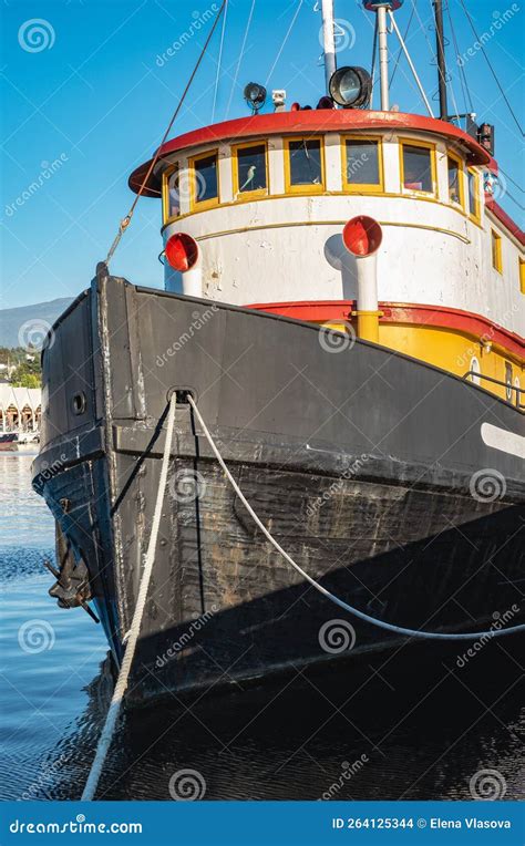 Old Tugboat In A Sunny Summer Day Tug Boats Are Working In A Harbor