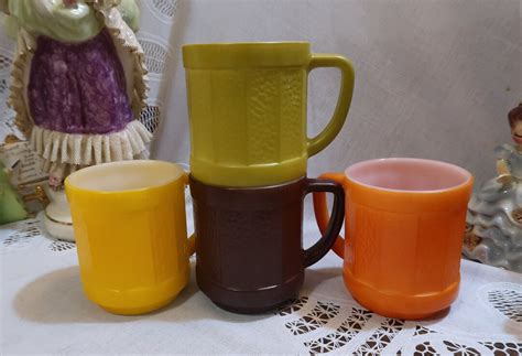 Set Of 4 Vintage Federal Glass Milk Glass Coffee Mugs Yellow Orange Brown Green Fired Finish