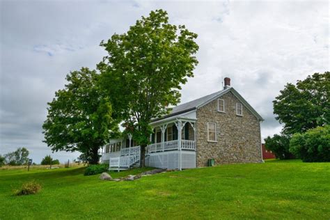 Circa Historic Stone Farmhouse For Sale W Outbuildings And River