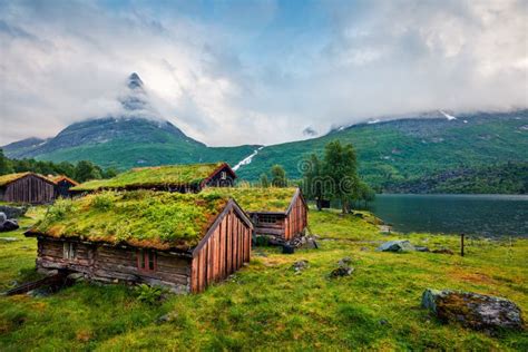 Norwegian Typical Grass Roof Wooden House On The Innerdalsvatna Lake