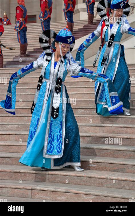 Mongolian Dancers In Traditional Clothing Perform On The Stairs Of The Government House Ulaan