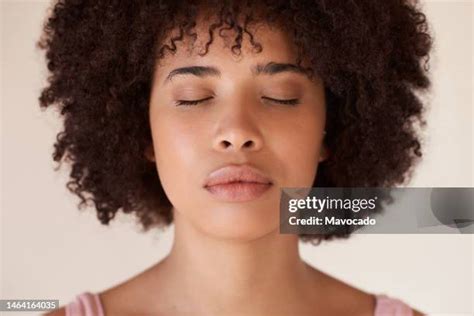 Black Woman Eyes Closed Photos And Premium High Res Pictures Getty Images