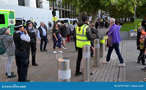 Stewards Controlling The The Queue Through Jubilee Park To See Queen