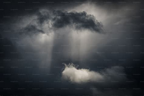 A black and white photo of a storm cloud photo – Dark Image on Unsplash