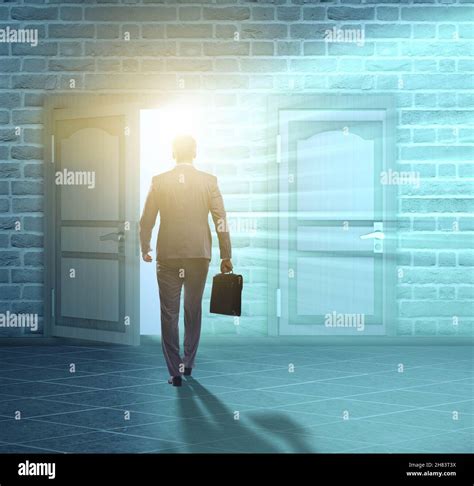 The Businessman Walking Towards Open Door Stock Photo Alamy