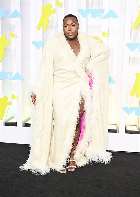 Saucy Santana Gets Edgy In Feathered Dress And Pearly Heels At Mtv Vmas