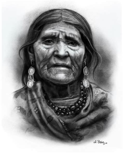 An Old Native American Woman In Black And White