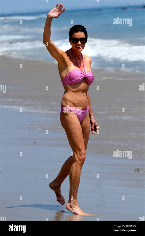 Janice Dickinson Shows Off Her Amazing Figure In A Blink Bikini As She
