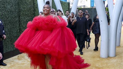 Lizzo Just Ted Her Iconic 2022 Emmy Awards Tulle Gown To A Fan