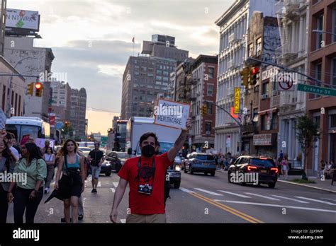 The Protesters Holding Out Cardboard Signs About Body Freedom After