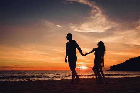 Premium Photo Love Romantic Couple Holding Hands Beach Sunset