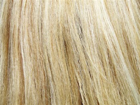 Premium Photo The Blonde Hair In A Bright Sunny Day