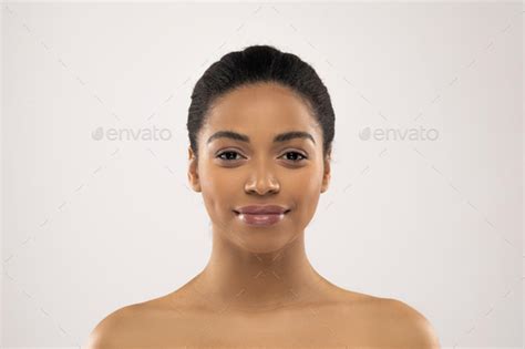 Beautiful Millennial African American Woman Posing Half Naked On Colorful Background Stock Photo