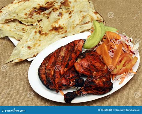 North Indian Punjabi Tandoori Chicken With Butter Naan Stock Image