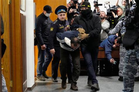 Display Of Battered Men Was Russias Warning To The Public Analysts