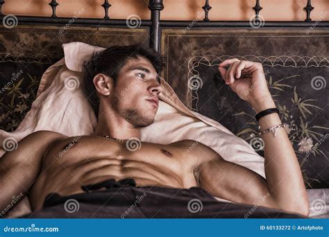 Shirtless Male Model Throwing Punch Towards Camera Royalty Free Stock