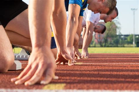 Athletes at the Sprint Start Line in Track and Field Stock Image ...