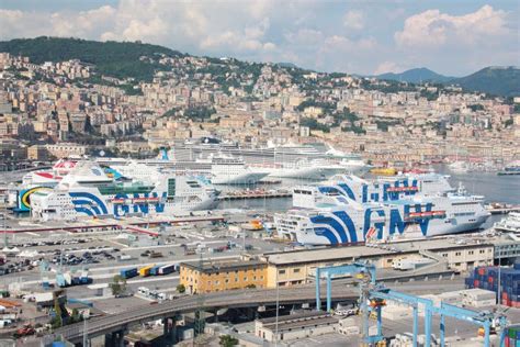 Ferry Boats And Cruise Ships Docked In The Port Of Genoa Italy