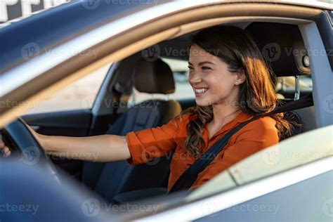 Happy Woman Driving A Car And Smiling Cute Young Success Happy