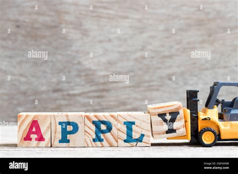 Toy Forklift Hold Letter Block Y To Complete Word Apply On Wood