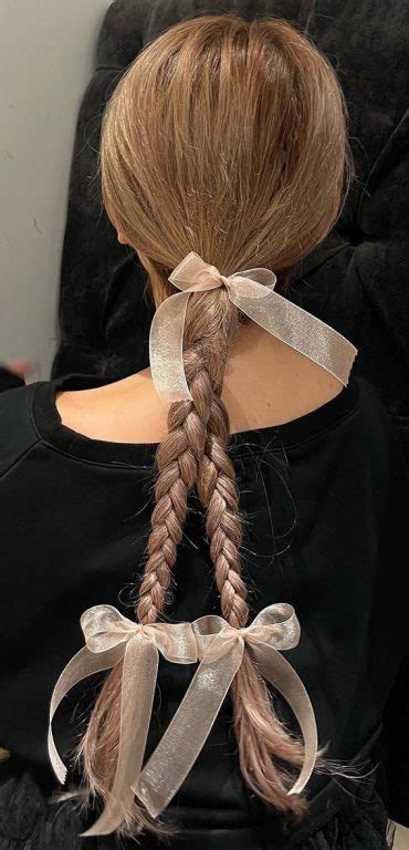 A Trendy Collection Of Hairstyles Adorned With Chic Bows Braids Tied