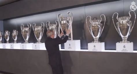 Real Madrid's fourteenth Champions League trophy shining in cabinet