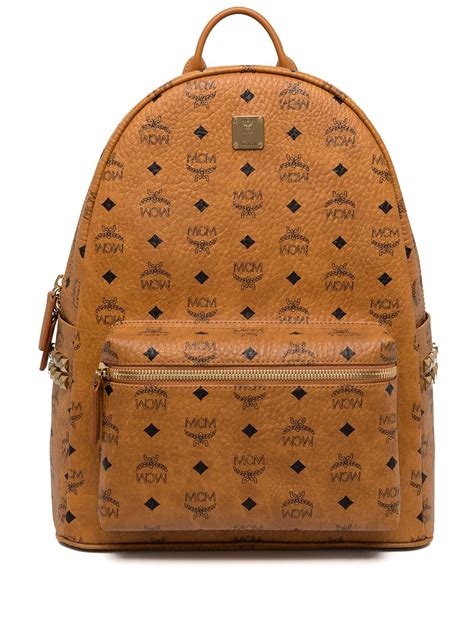 Mcm Large Stark Side Studded Backpack In Brown Modesens