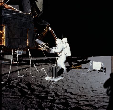 Apollo 12 Mission Image Alan Bean Unloads Alsep Rtg Fuel Cask From