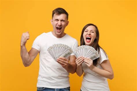 Overjoyed Couple Woman Man Football Fans In Yellow Green T Shirt