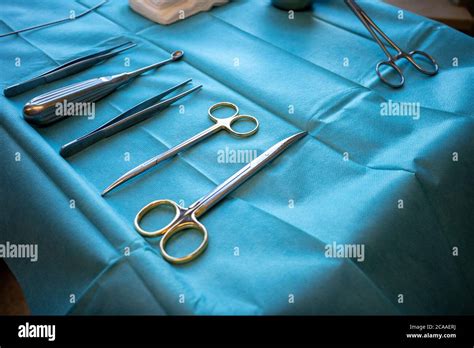 In An Operating Room There Is An Instrument Table With Surgical