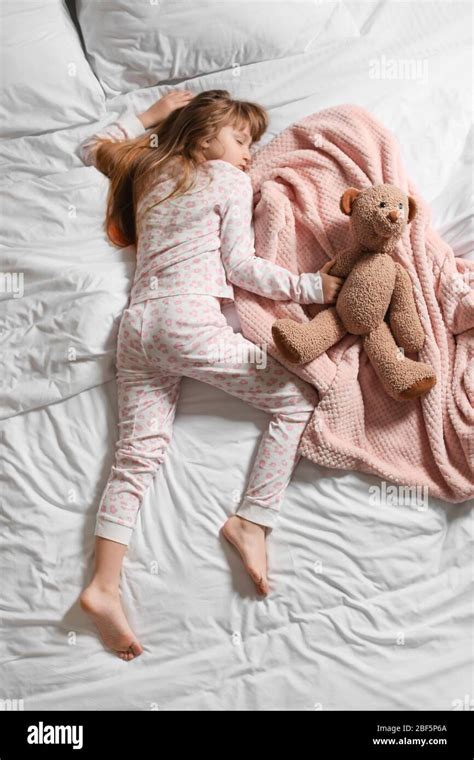 Cute Little Girl Sleeping In Bed Stock Photo Alamy