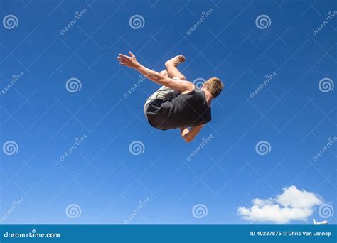 Boy Jumping Somersault Blue Parkour Stock Image Image Of Parkour