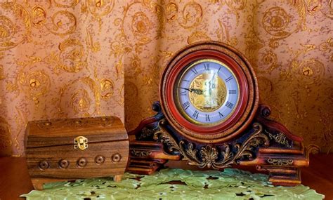 Premium Photo Photo Of An Old Clock And Casket On Brown Background