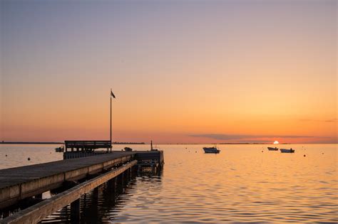 Wallpaper Sunlight Boat Sunset Sea Bay Water Shore Reflection