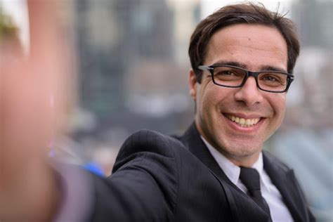 Premium Photo Portrait Of Smiling Man Wearing Mask