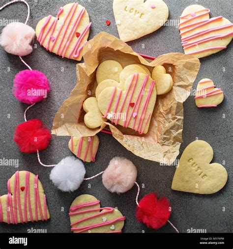 Vanilla Sugar Cut Out Cookies With Pink Glaze And Sprinkles For