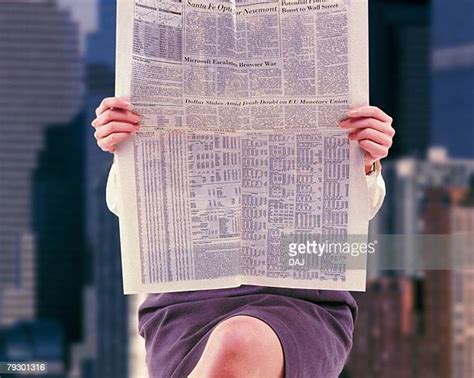 Newspaper Hiding Face Photos Et Images De Collection Getty Images