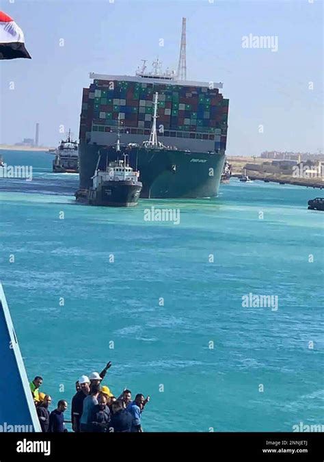 In This Photo Released By Suez Canal Authority The Ever Given A Panama Flagged Cargo Ship Is