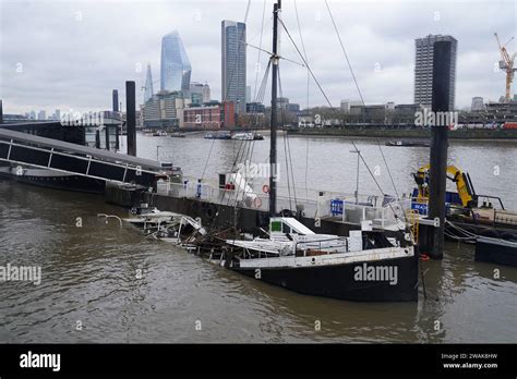 The Bar And Co Boat Which Is Moored At Temple Pier Juts From The Water