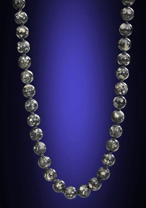 Lunar Bead Necklace And Asteroid Emoji” Head To Auction