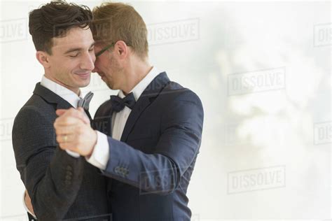 Caucasian Gay Grooms Dancing At Wedding Royalty Free Stock Photo Dissolve